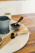 Load image into Gallery viewer, two coffee scoops with grounds in bowl and french press