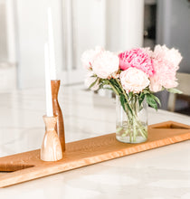 Load image into Gallery viewer, two candleholders and flowers on board on counter
