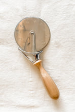 Load image into Gallery viewer, maple wood handle pizza cutter on white background
